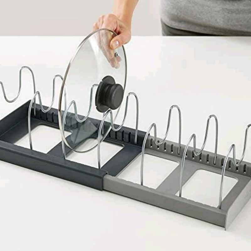 Expandable pan and lid rack with adjustable dividers for kitchen cabinets